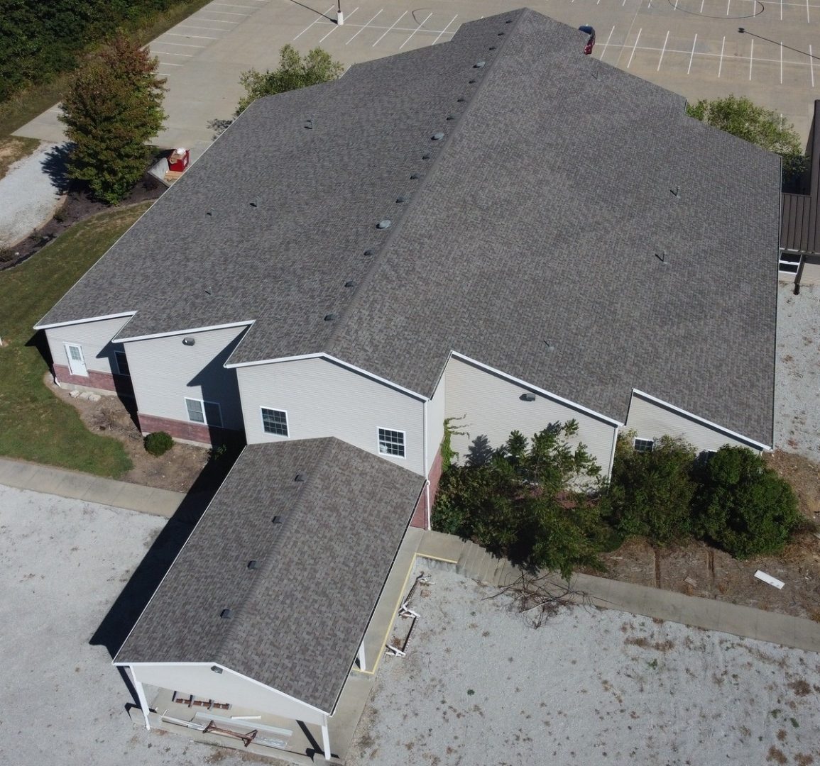 Commercial shingle building — large roof replacement